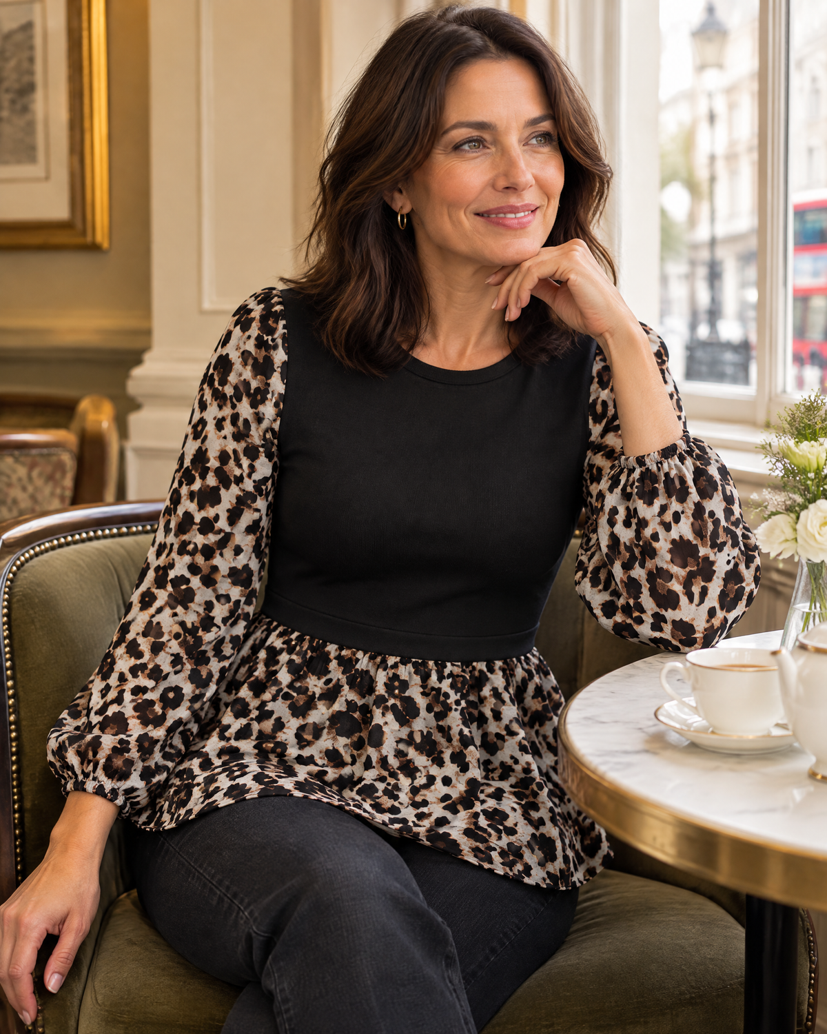 Chelsea peplum top worn in a London tea room
