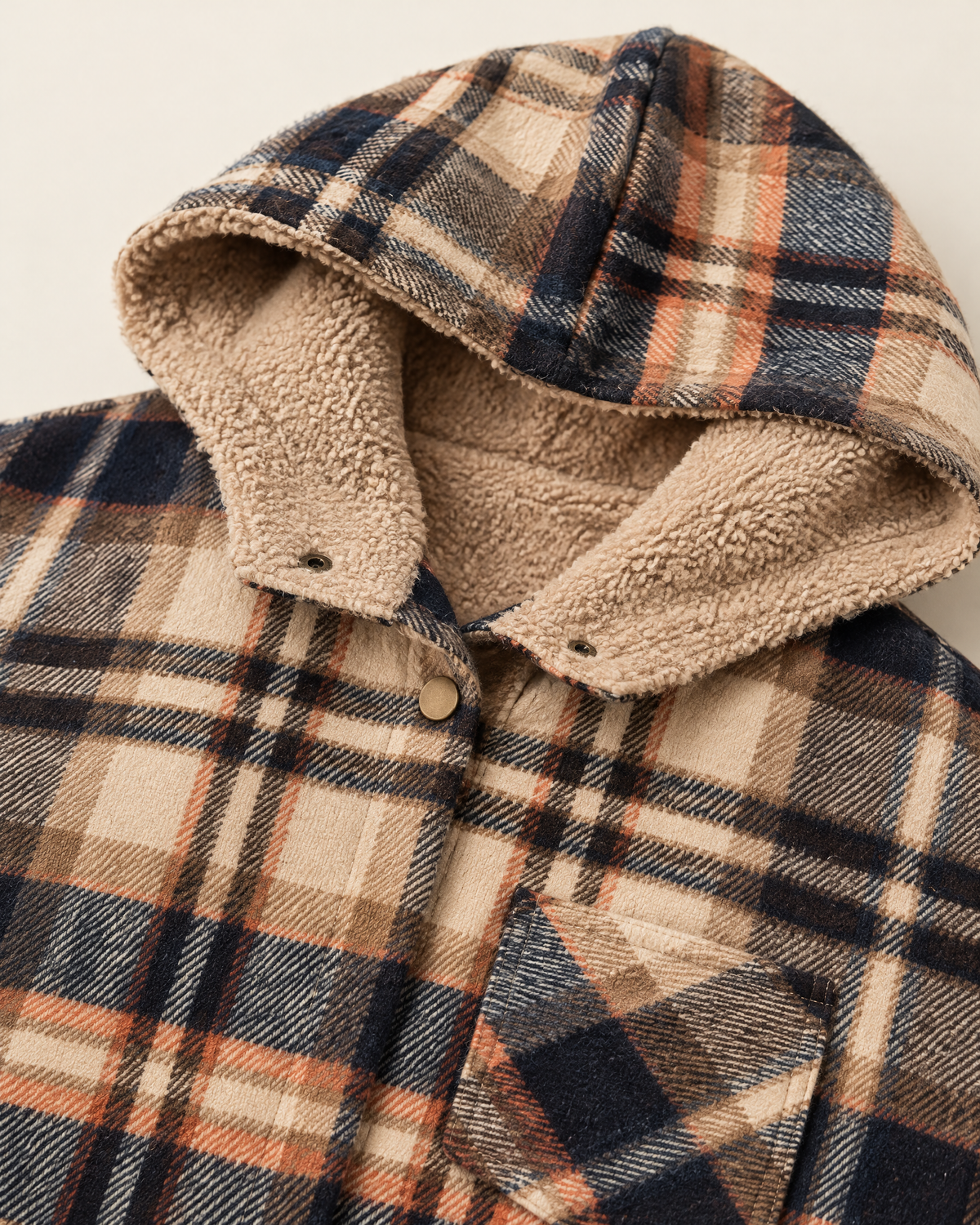 Fleece-lined hood and snap detail